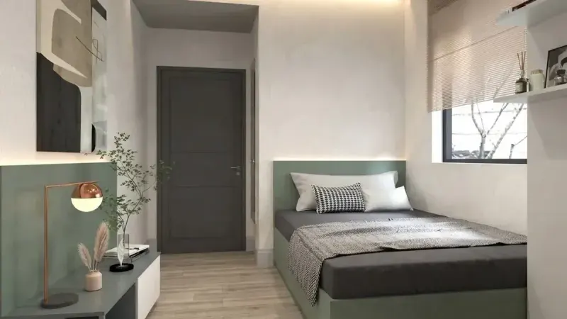 Sage green single dorm room example