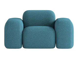 Example furniture photo: a teal boucle armchair with rounded cushion arms