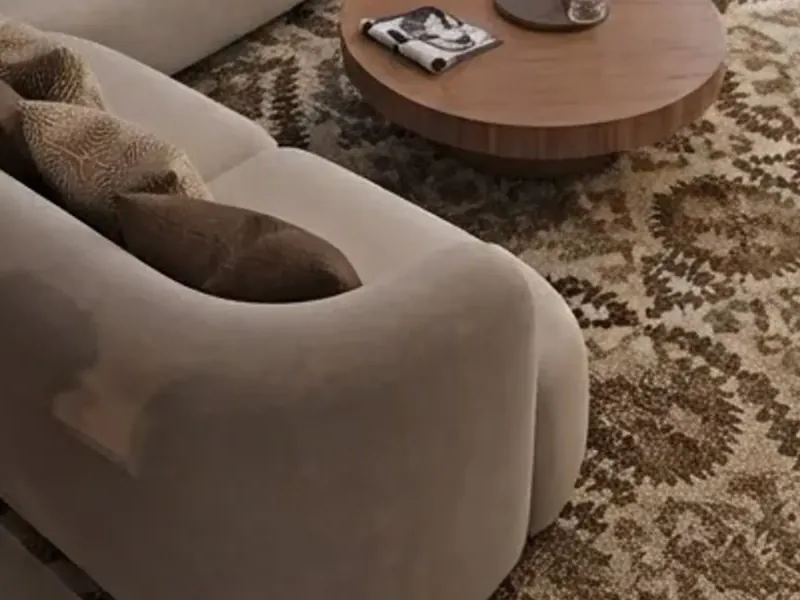 Patterned rug and bouclé sofa, source render enlarged at 100%