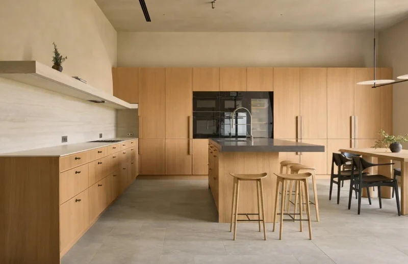 AI-designed handleless oak kitchen with island seating