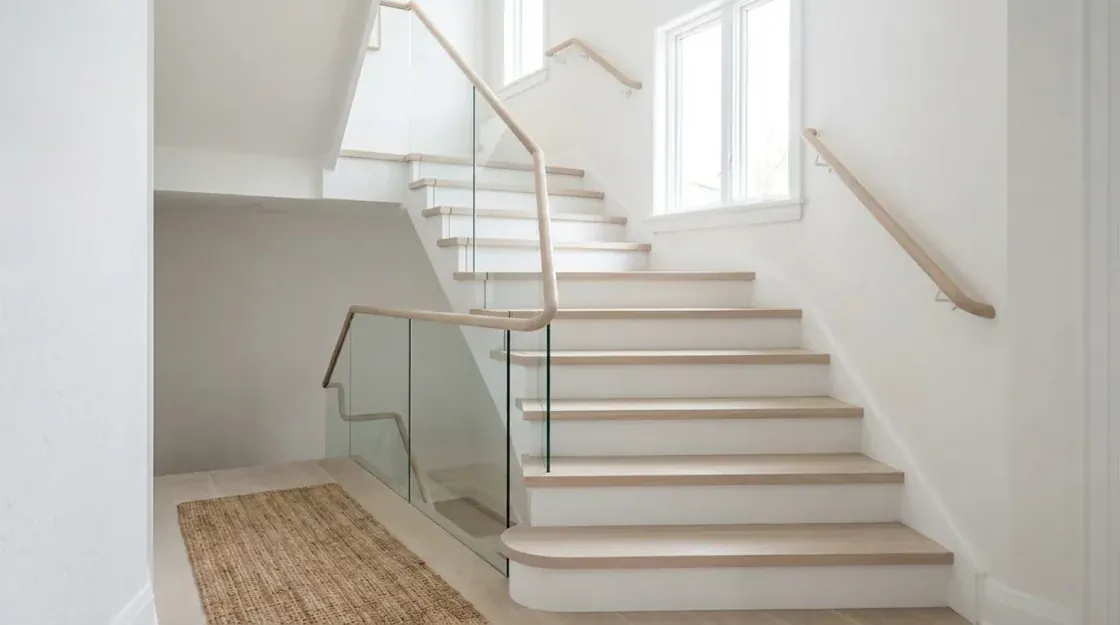 Same staircase restyled in bright Scandinavian pale oak