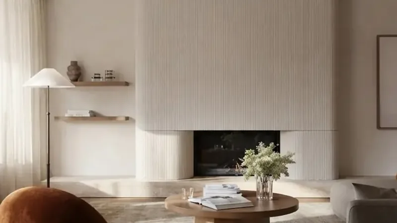 Warm modern living room staged around a minimal fireplace wall