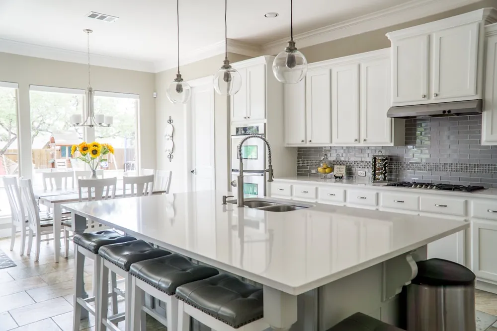 Scandinavian AI kitchen design with pale wood cabinets, white walls and open shelving