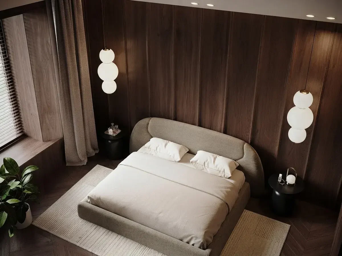 Bedroom render with an upholstered queen bed and curved headboard against walnut panelling, a black nightstand and pendant lights on each side