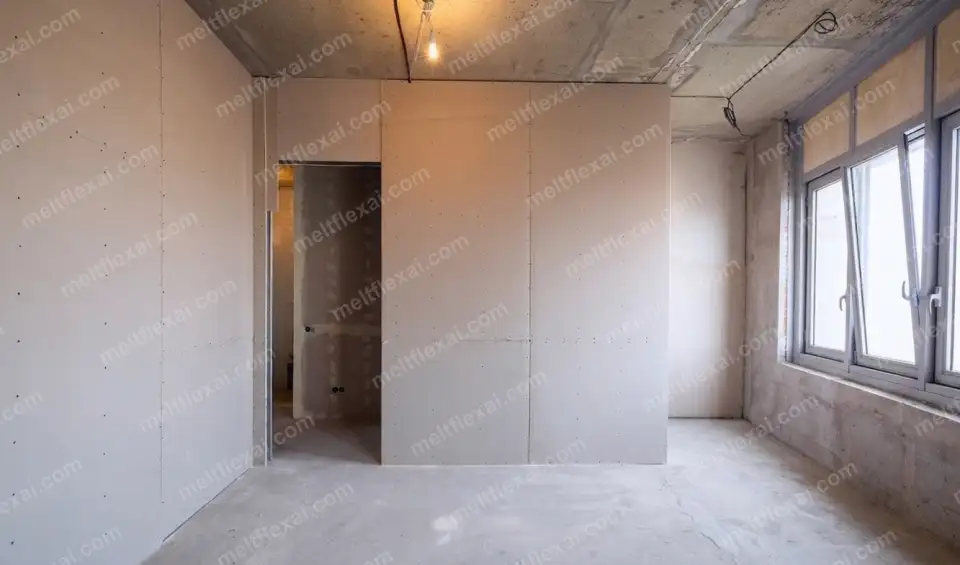 Empty room with finished drywall before any paint, flooring, or furniture