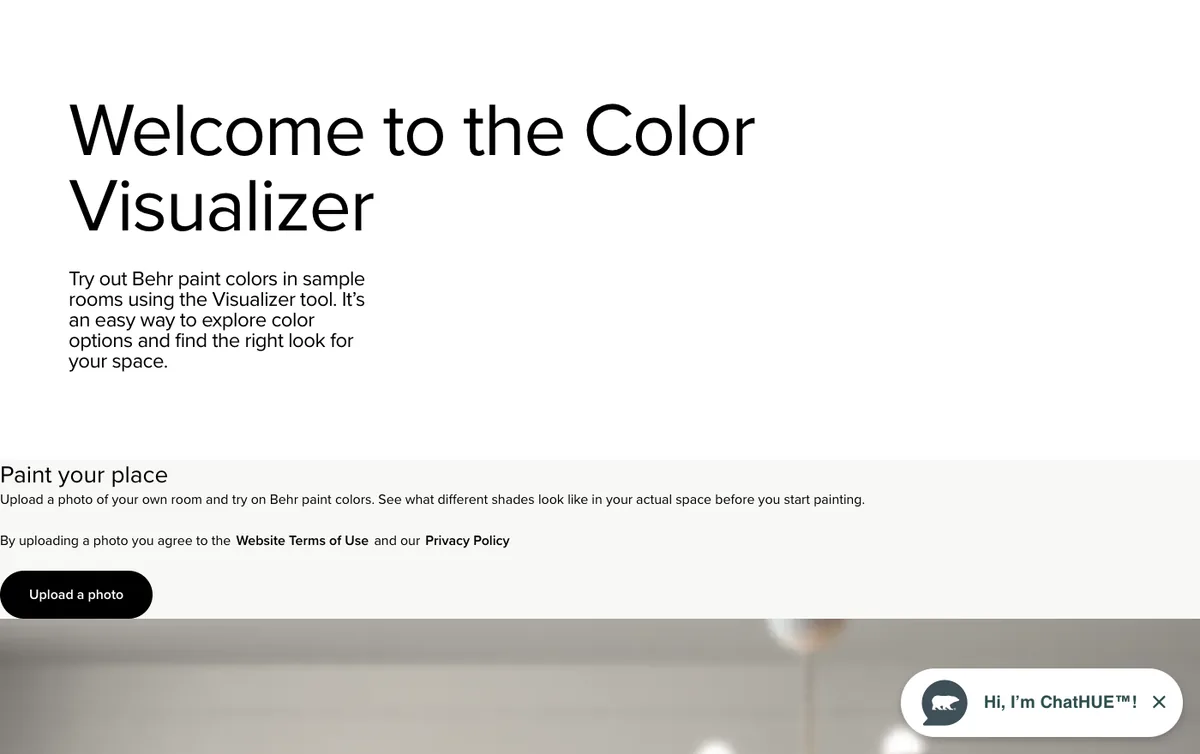 Screenshot of the Behr color visualizer landing page showing the sample room visualizer and the Paint Your Place photo upload