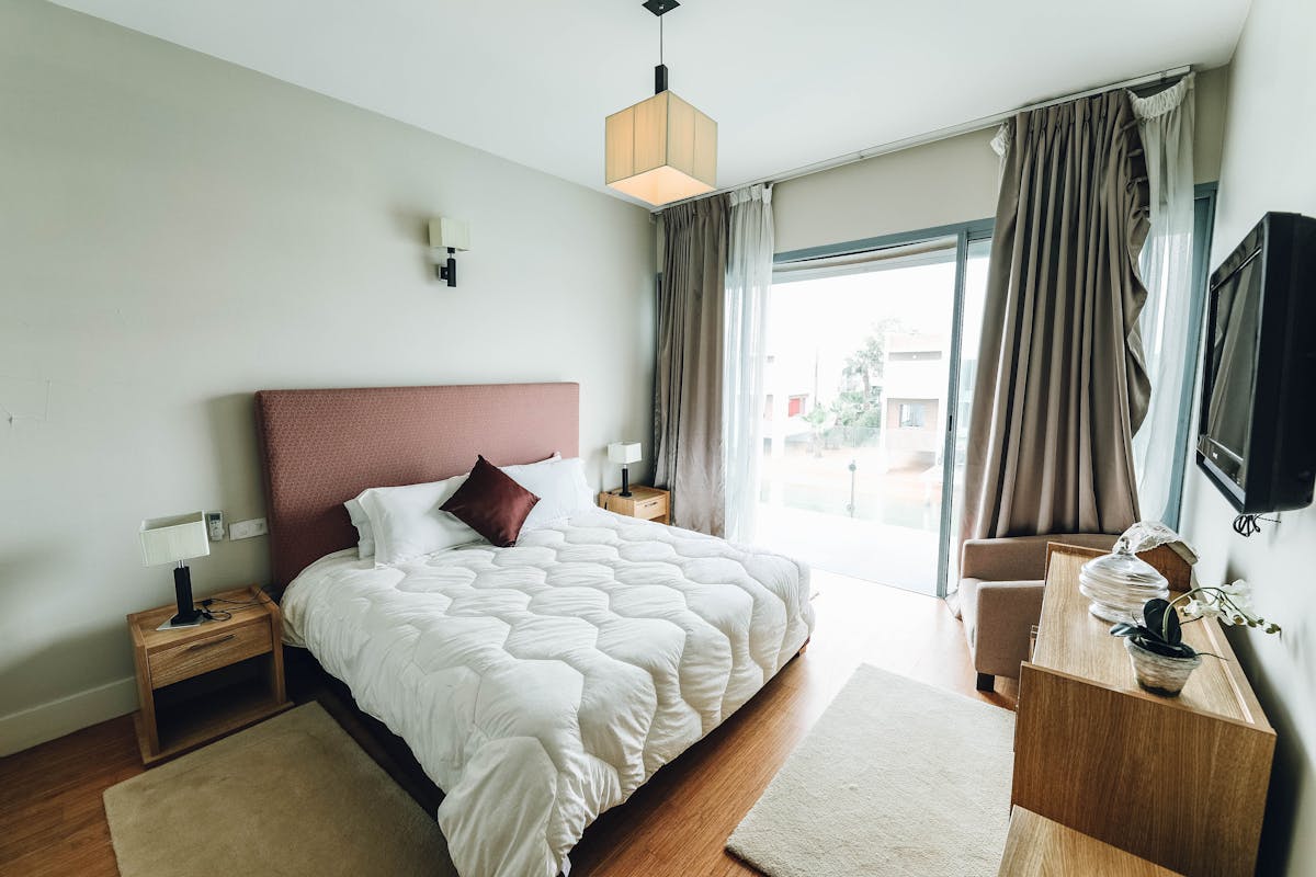 Industrial interior with exposed brick, steel beams, and raw materials