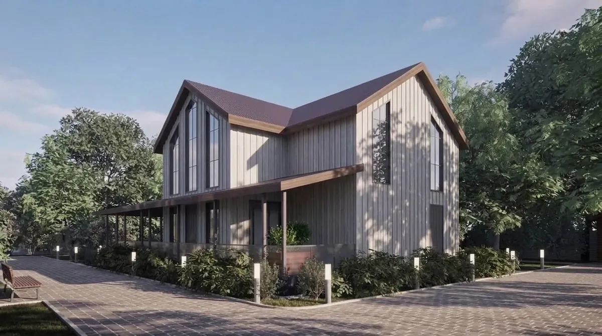 The same house re-clad in light board and batten siding on every wall, with the same windows, gables, porch, trees and paved path
