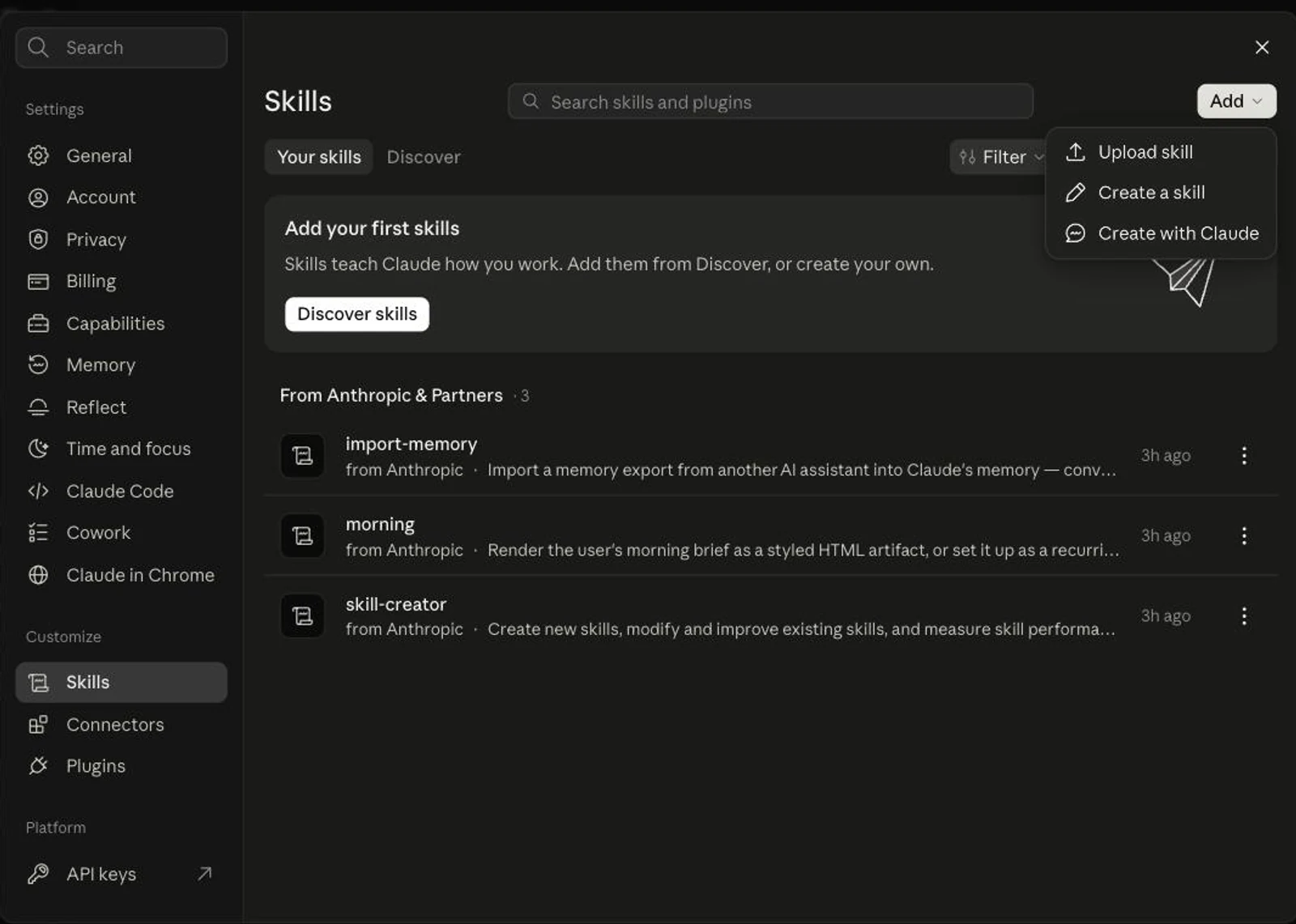 The Your skills tab in claude.ai Settings with the Add menu open, showing three options: Upload skill, Create a skill, and Create with Claude, above the three skills that ship from Anthropic and partners: import-memory, morning and skill-creator