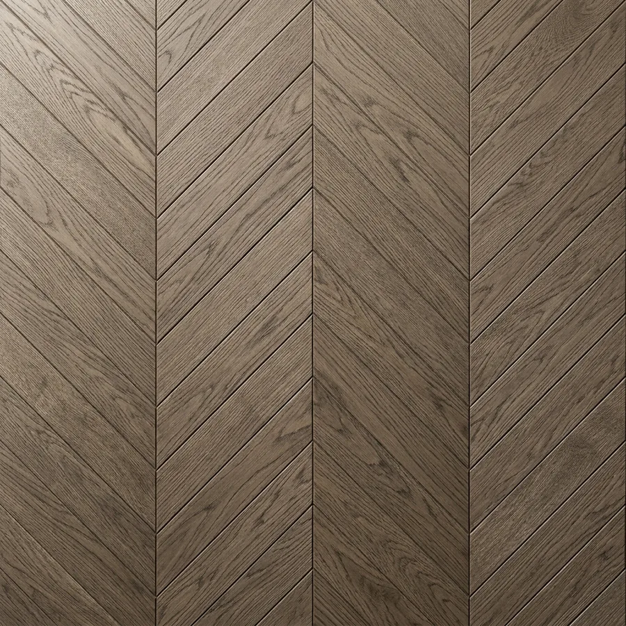 Close-up texture swatch of chevron parquet flooring in smoked oak with boards meeting in sharp points