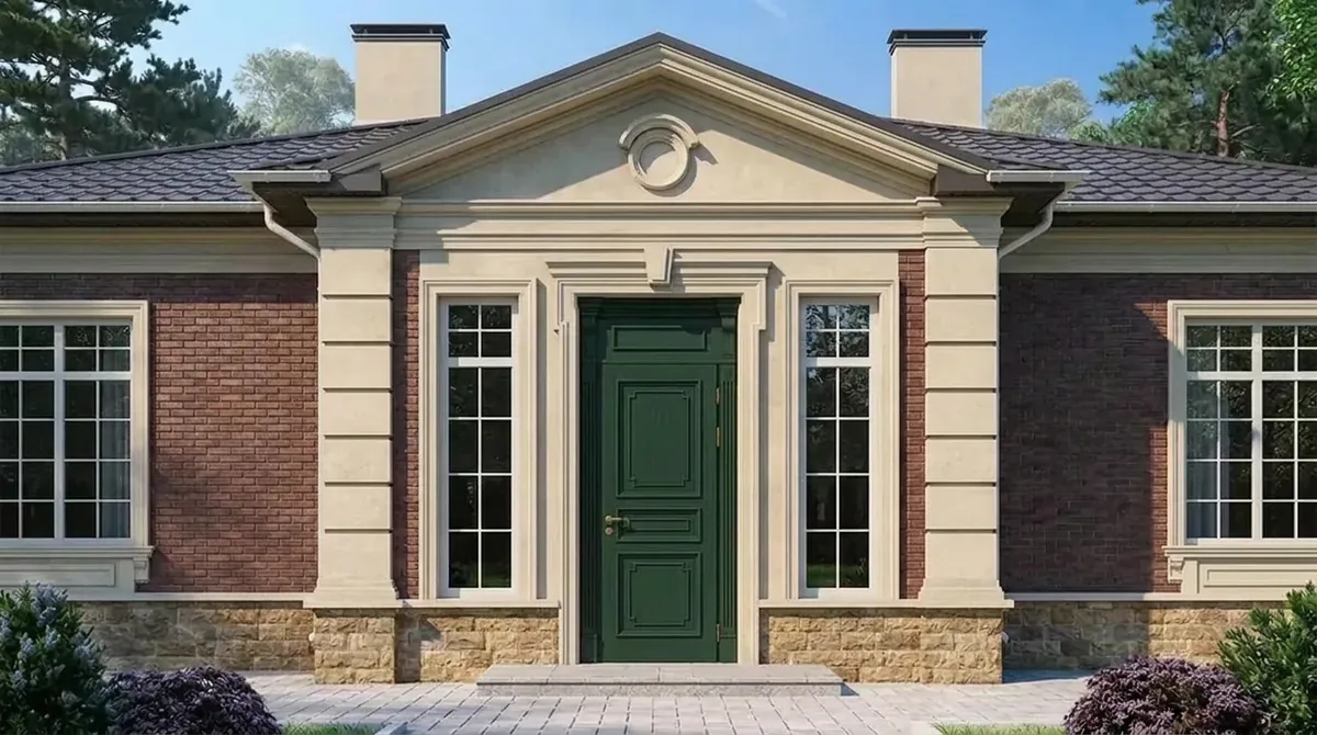 The red brick house with a cream stone pediment entry, the front door painted dark hunter green