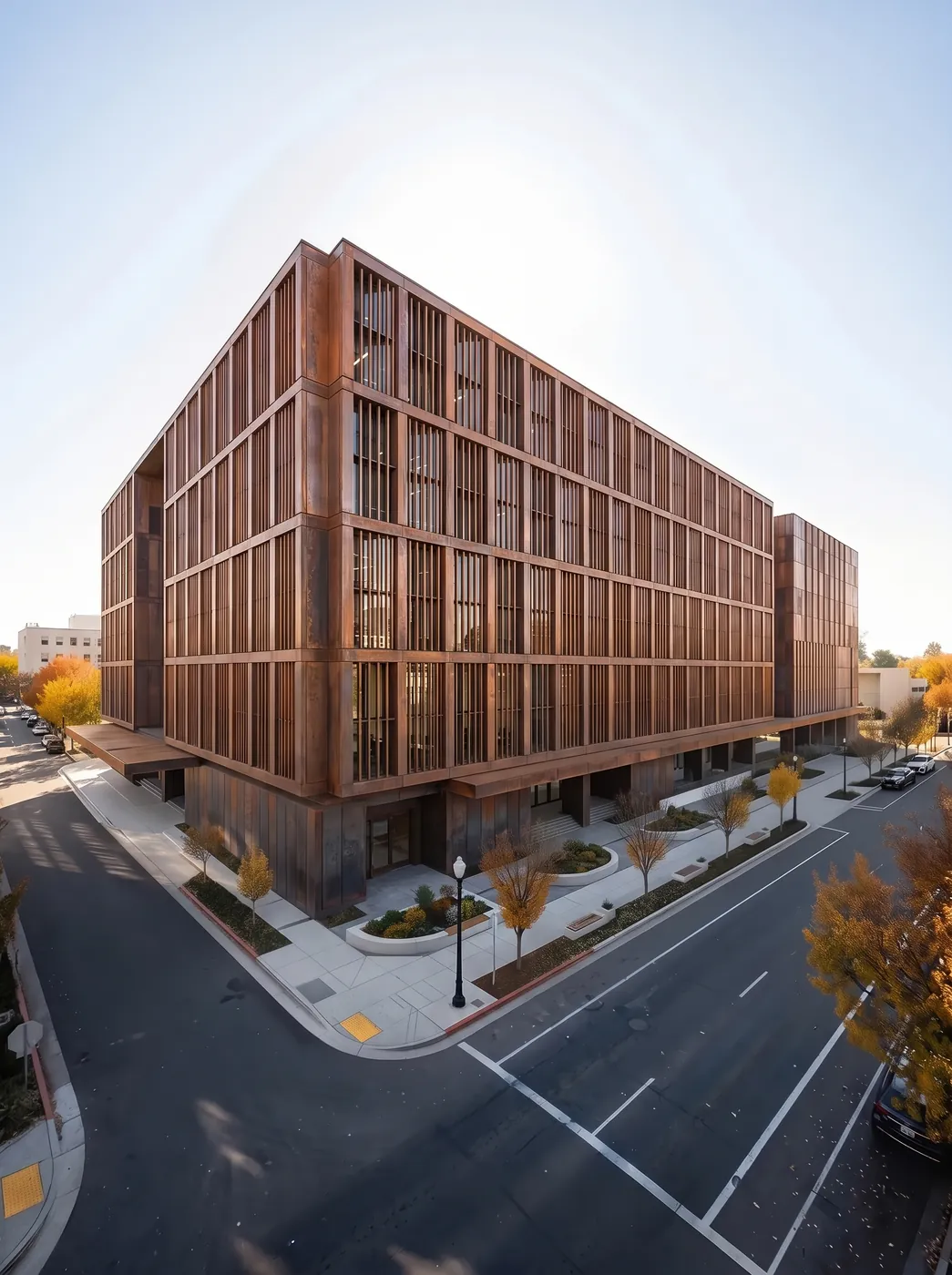 Office block on a street corner restyled by Nano Banana 2.1 with the copper cladding and vertical fins of a second building