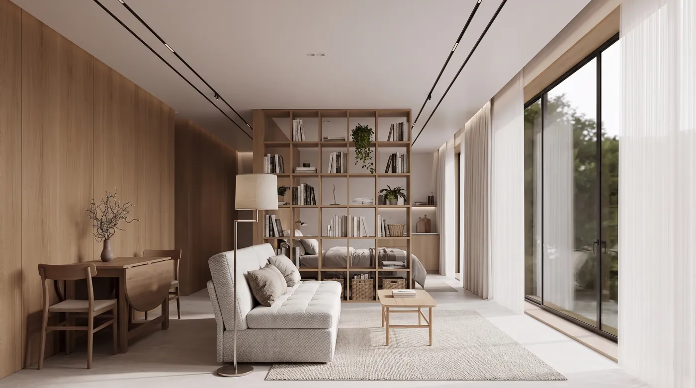 Small studio apartment furnished by Nano Banana 2.1 with a compact sofa, a drop-leaf table with two chairs, a floor lamp and a ceiling-height bookcase used as a room divider