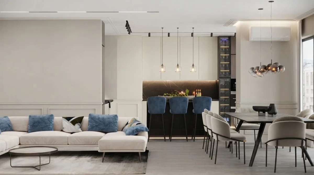 Kitchen with shaker cabinets painted Alabaster, a dark stone island with navy stools, and Agreeable Gray walls