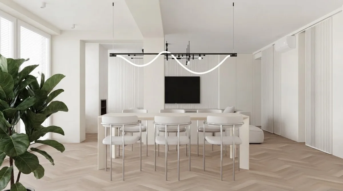 Dining room with a long pale table, cream chairs and a linear pendant, walls in Alabaster