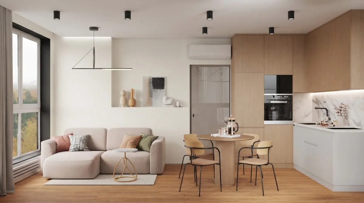 Living room with a beige sofa, a round wood dining table and a large window, walls in Alabaster