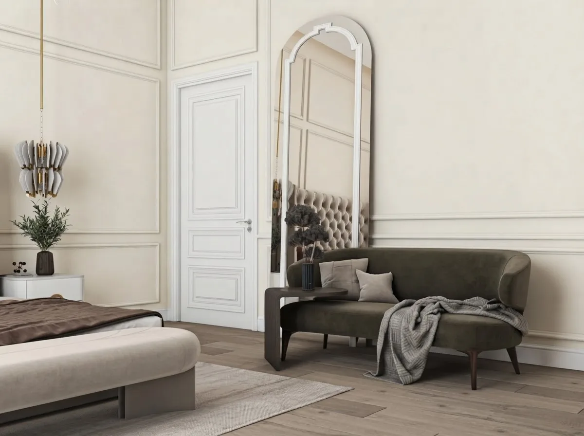 Classic bedroom corner with panel moulding, an arched mirror and a velvet settee, Alabaster walls with slightly brighter Pure White trim