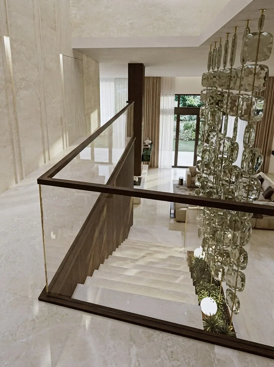 Floating white marble stairs with a hanging screen of green glass discs and planting at the base