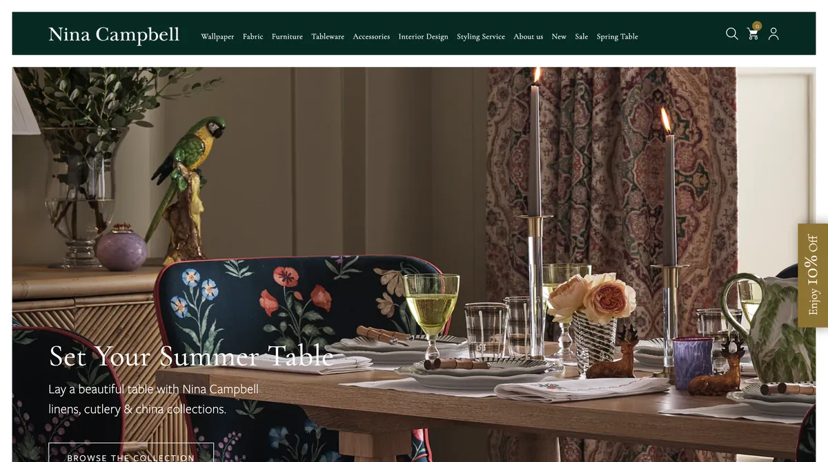 Screenshot of the Nina Campbell website showing a classic English decorative interior with pattern