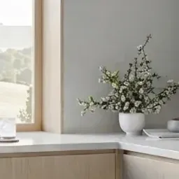 white vase with flowers