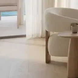 white bouclé armchair