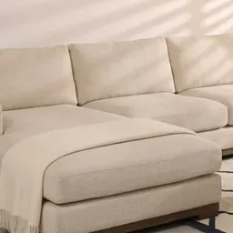 l-shaped cream sofa