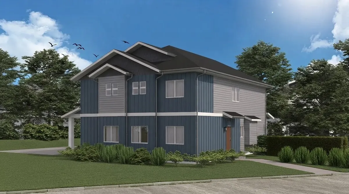 Two story suburban house with navy board and batten siding on the front gables and wings and pale grey lap siding on the side walls, white trim and a small covered entry
