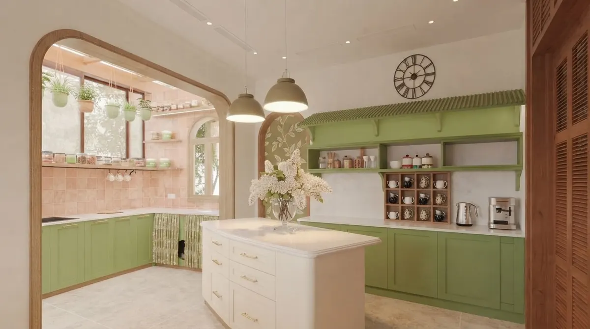 Kitchen with light sage green painted base cabinets and open green shelving, a white island, pendant lights and an arched opening to a sunroom