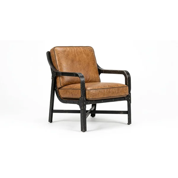 Riveted metal armchair